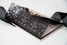 black laser cut wedding invitation