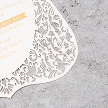 flat laser cut invitation with fancy border