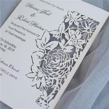 flat laser cut invitation with floral design