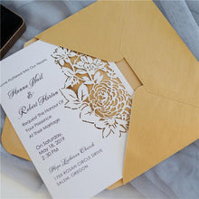 flat laser cut invitation with floral design