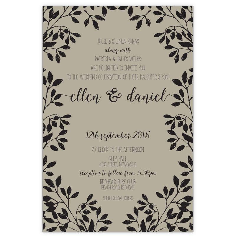 Rustic wedding invitation with leaf border.
