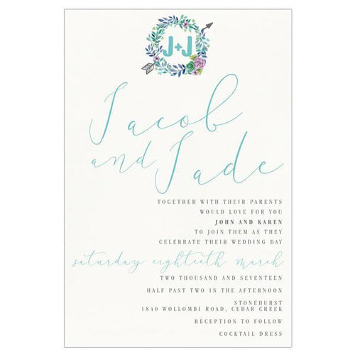 Pretty flower wreath wedding invitation design featuring succulents.