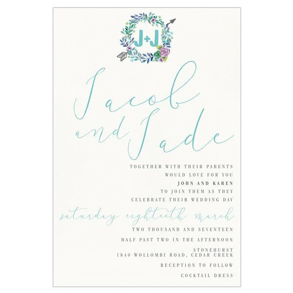 Pretty flower wreath wedding invitation design featuring succulents.